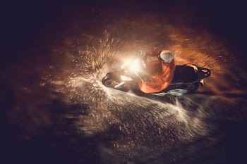 Person Driving on Water