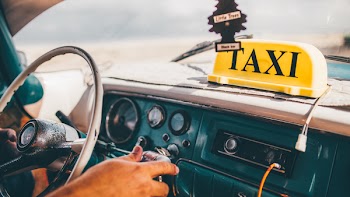 Person Driving Taxi