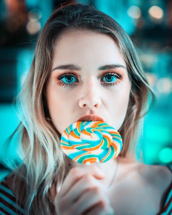 Person Eating Lollipop