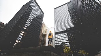 person facing on buildings