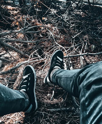 Person Feet on Twigs