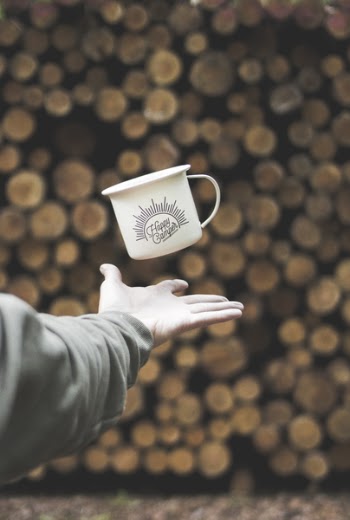 Person Flipping White Mug With Happy Camper Print