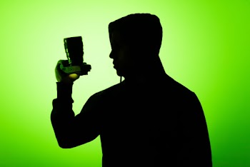Person Holding A Camera