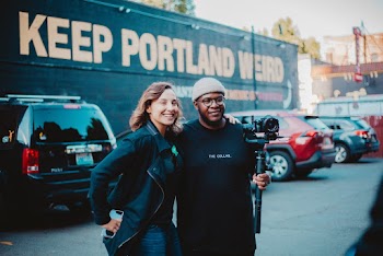 Person Holding A Camera