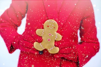 Person Holding A Gingerbread