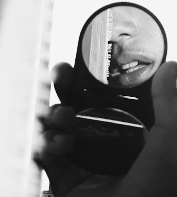 Person Holding A Mirror
