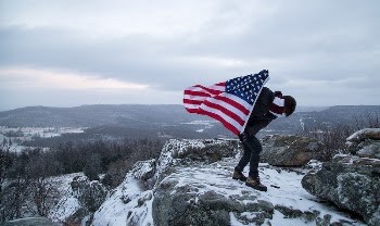 Person holding American flag image, | Free Photo - rawpixel