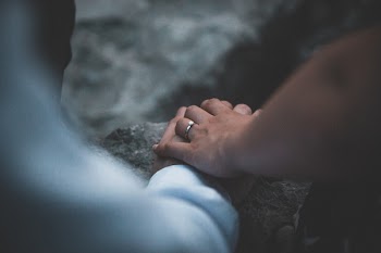 Person Holding Another Person's Hand