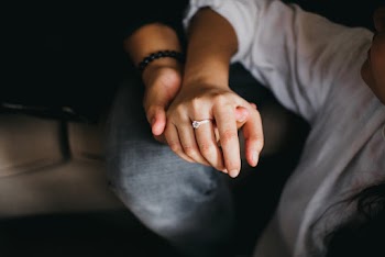 Person Holding Another Person's Hand