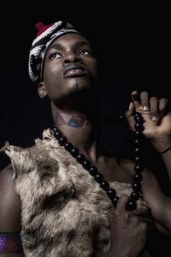 Person Holding Beaded Black Necklace