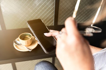 Person Holding Black Android Smartphone