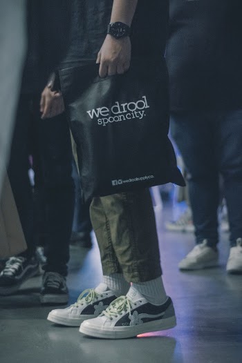 Person Holding Black Ecobag