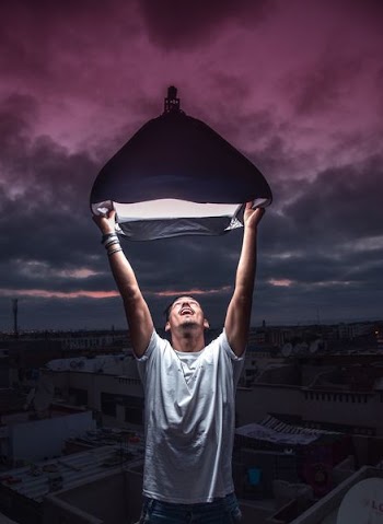 person holding black halogen light
