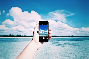 Person Holding Black Iphone