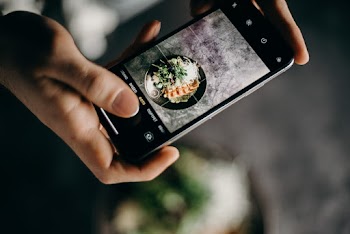 Person Holding Black Iphone 5