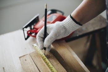 Person Holding Black Pencil