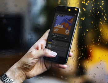 Person Holding Black Smartphone