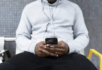Person Holding Black Smartphone