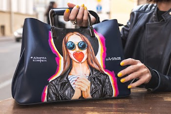 Person Holding Black Tote Bag