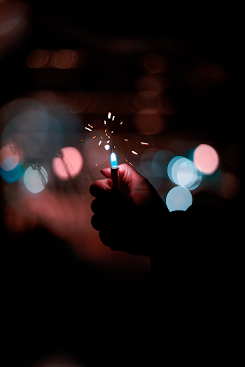Person Holding Blue Led Light