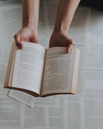 Person Holding Book