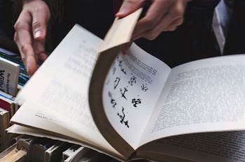 person holding book