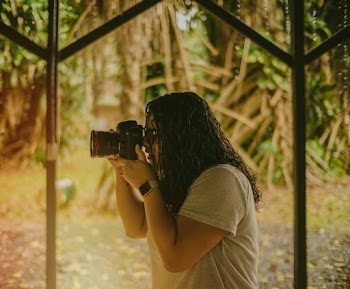 Person Holding Camera