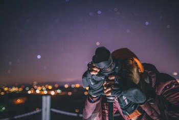 Person Holding Camera