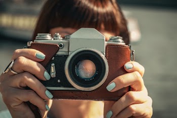 Person Holding Camera