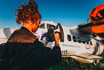 Person Holding Camera
