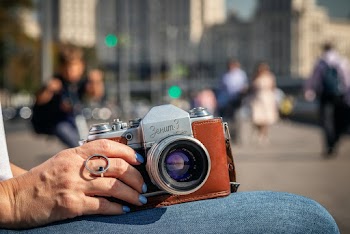 Person Holding Camera