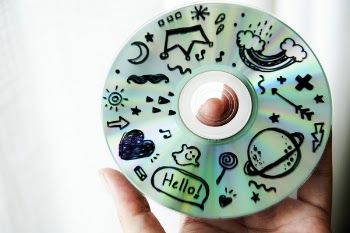 Person Holding Cd