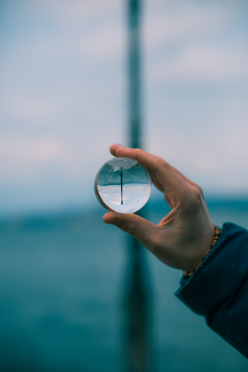 Person Holding Clear Ball