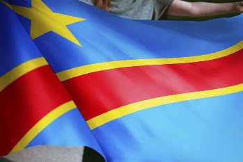 Person holding Congo flag background, | Free Photo - rawpixel