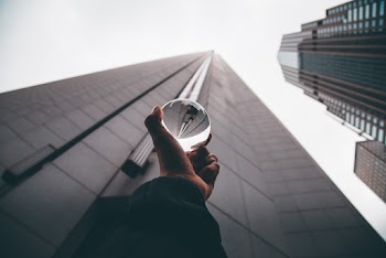 Person Holding Crystal Ball