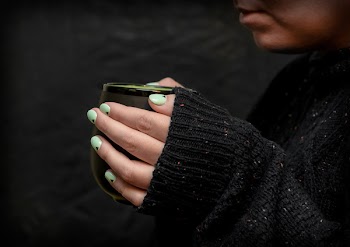 Person Holding Cup