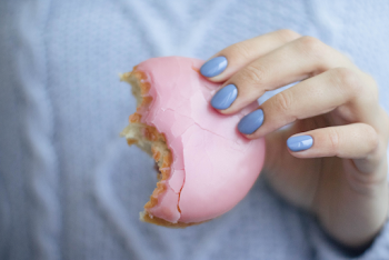 Person Holding Doughnut