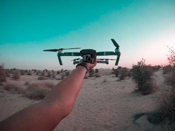 Person Holding Drone