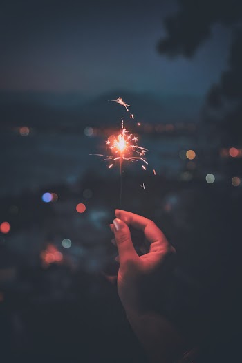 Person Holding Firecracker