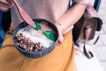 Person Holding Food Bowl