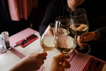 Person Holding Footed Glass