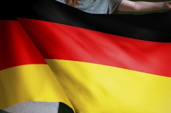 Person holding German flag background, | Free Photo - rawpixel