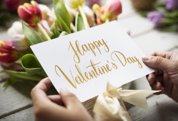 Person Holding Happy Valentine's Day Card