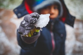Person Holding Ice Shard