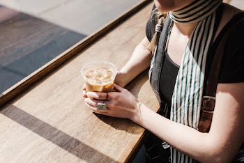 Person Holding Iced Coffee
