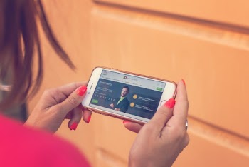 Person Holding Iphone