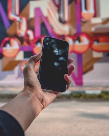 Person Holding Iphone 8