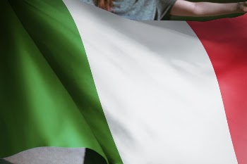 Person holding Italian flag background, | Free Photo - rawpixel