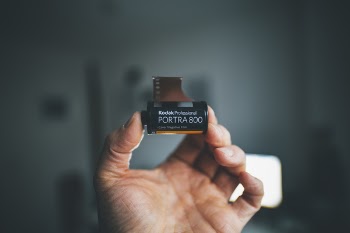 Person Holding Kodak Portra 800 Film Cartridge