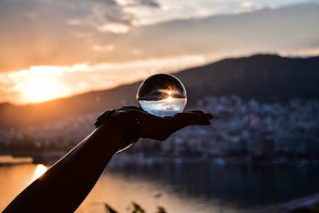 Person Holding Lensball